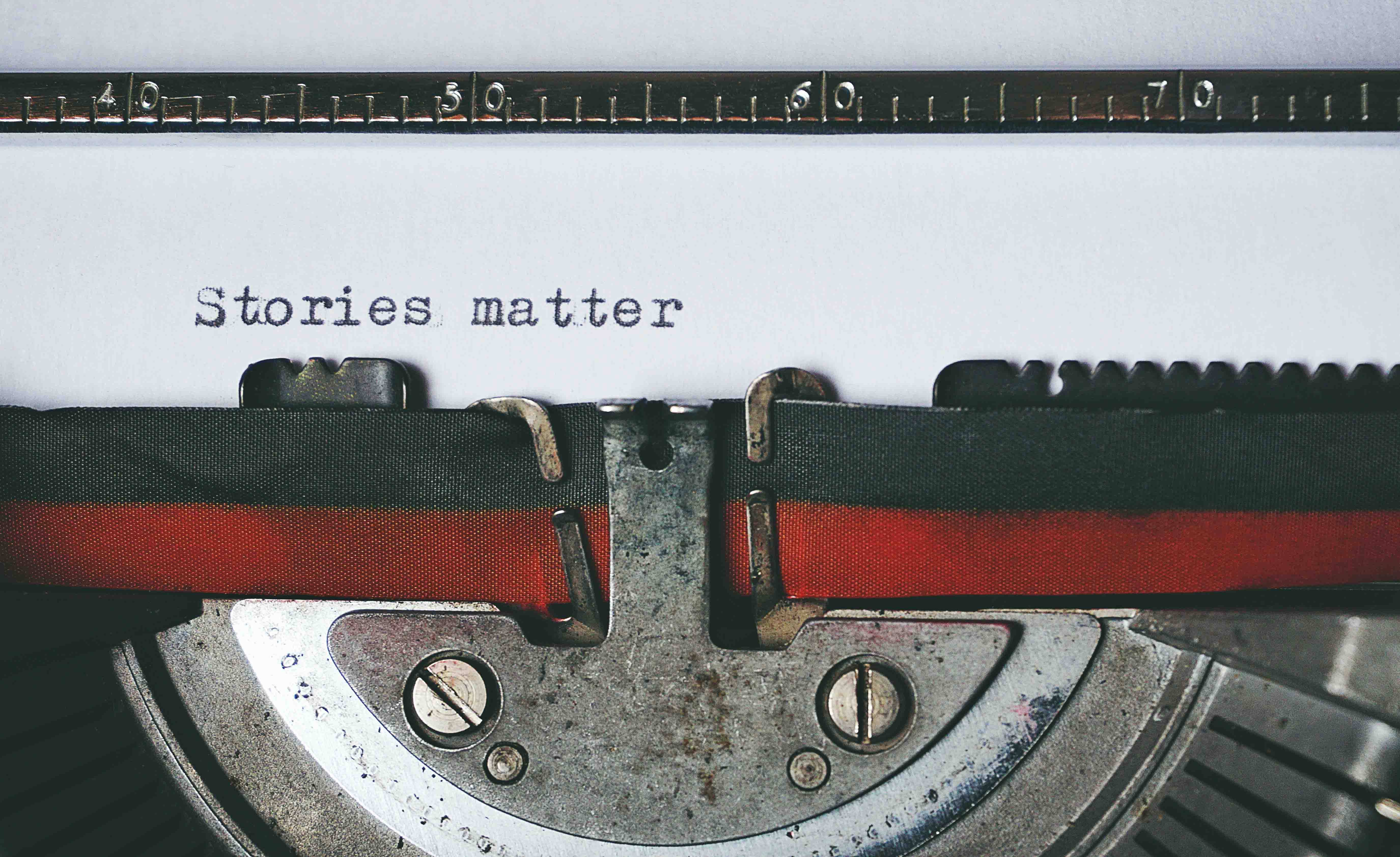A close-up shot of a paper with Stories matter typewritten on it.
